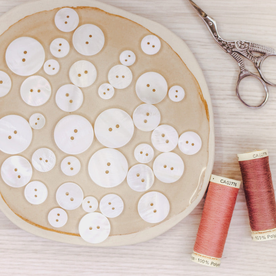 Fancy pearl buttons discount